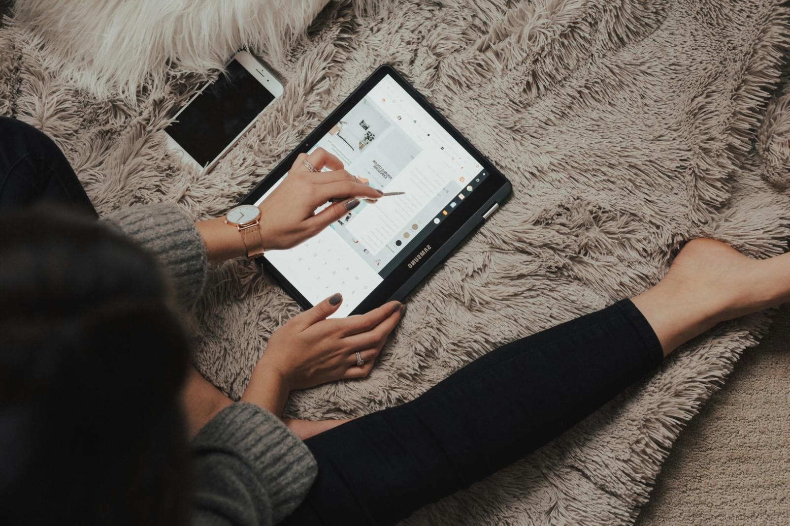 Students working collaboratively on cybersecurity analysis in modern learning environment